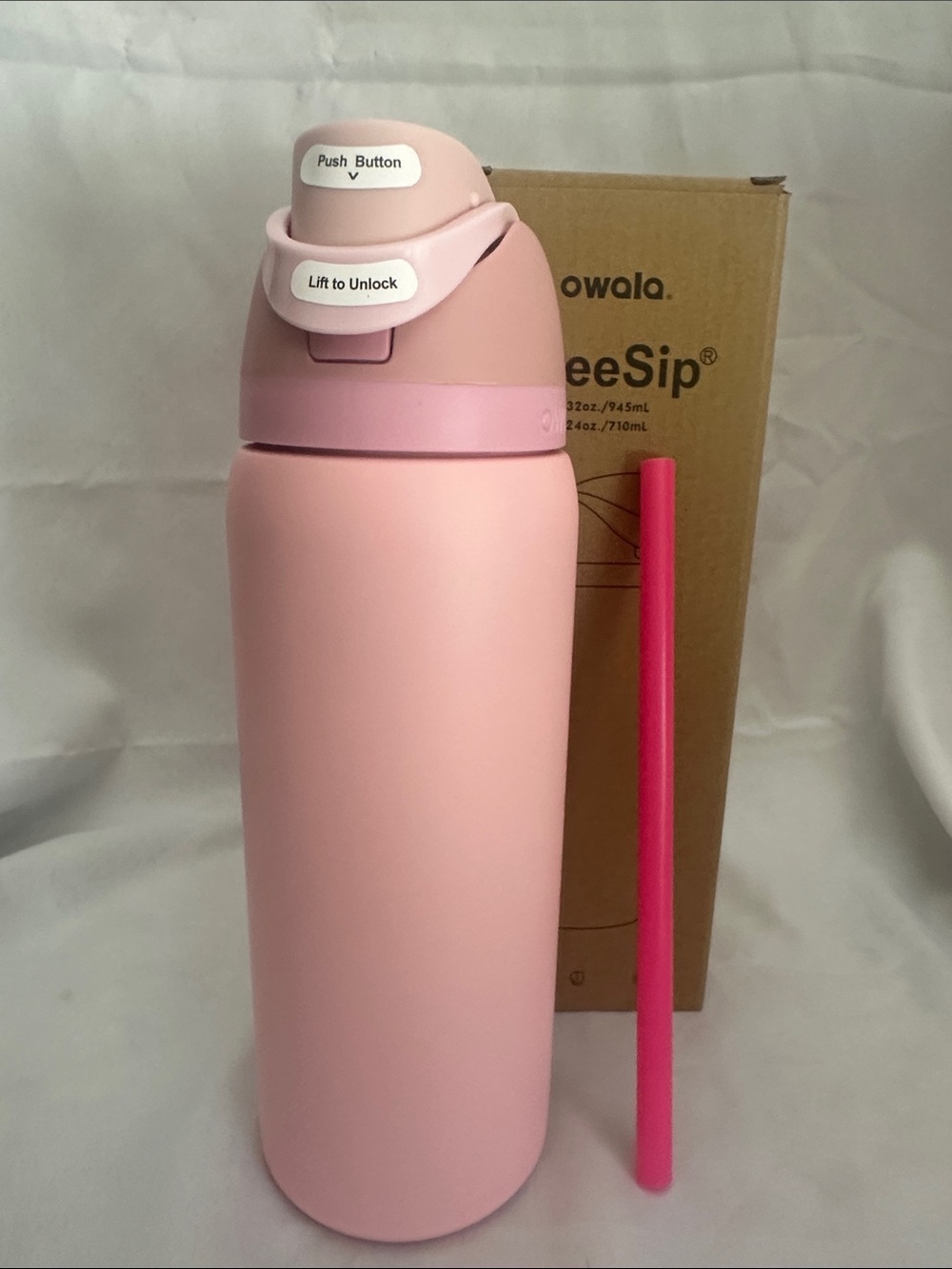 Owala insulated water bottle with a built-in straw. Rose Quartz 32oz
